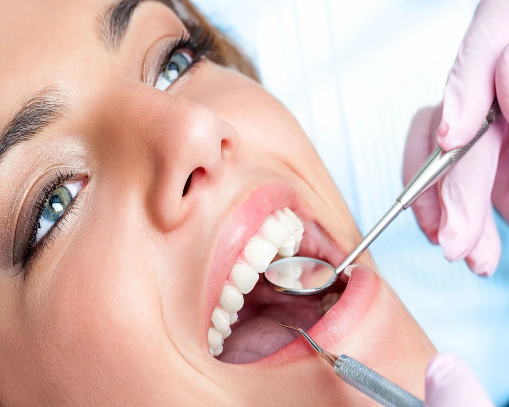 Healthy gums shown during dental examination at MiNa Family Dentistry Thornhill